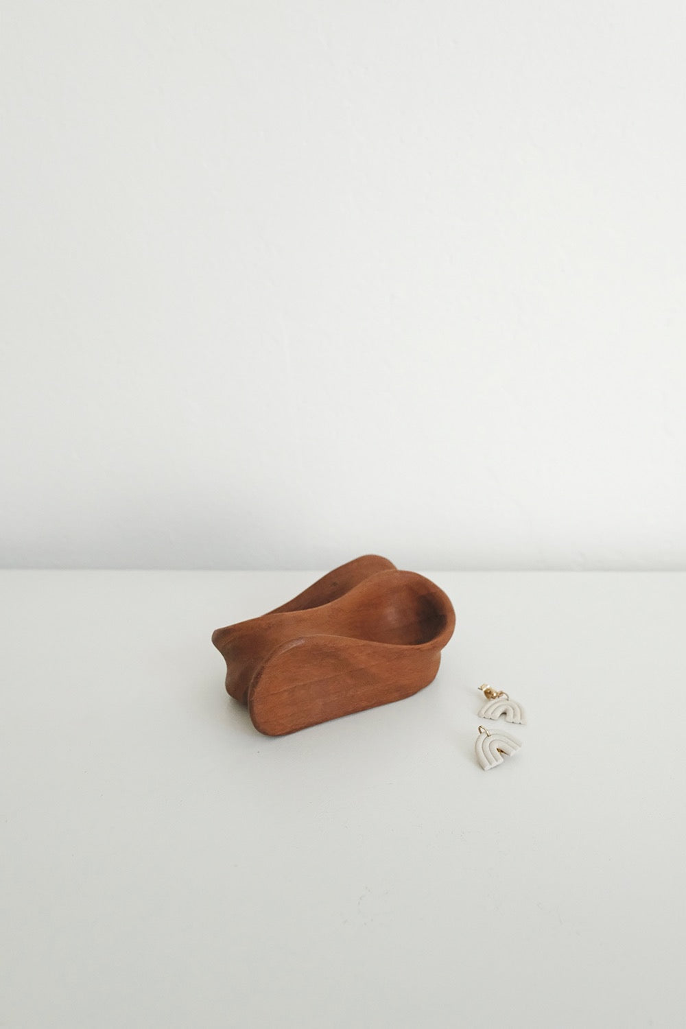 teak sculptural catchall