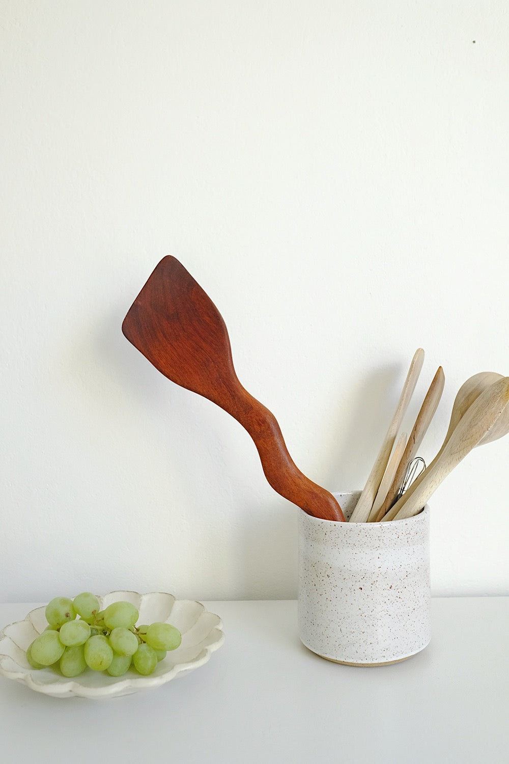 squiggly wooden spatula