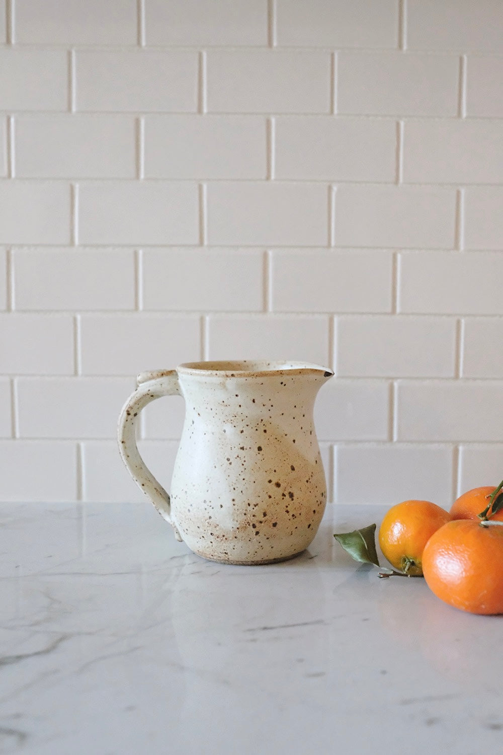 small ceramic pitcher