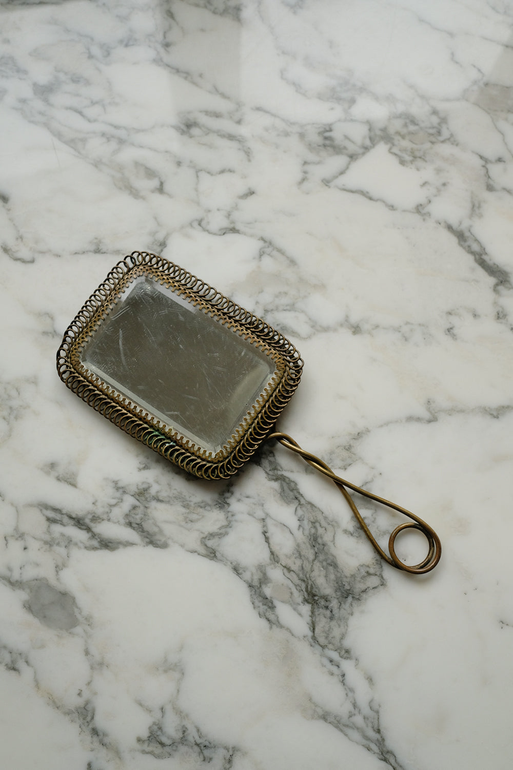 antique brass hand mirror