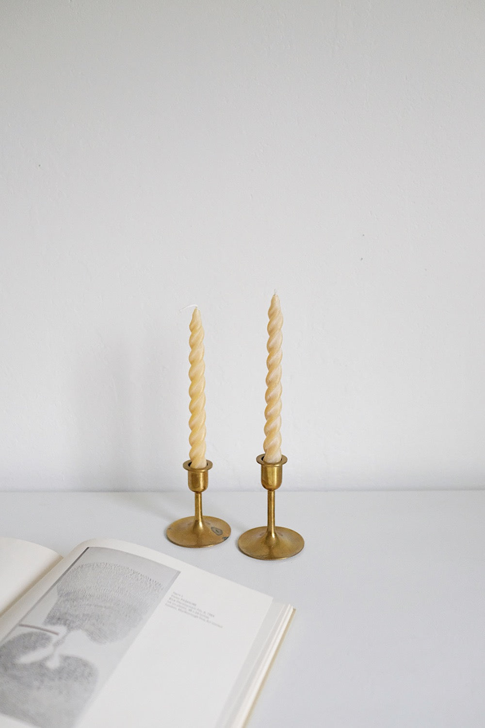 graduated brass candlesticks - set of 2