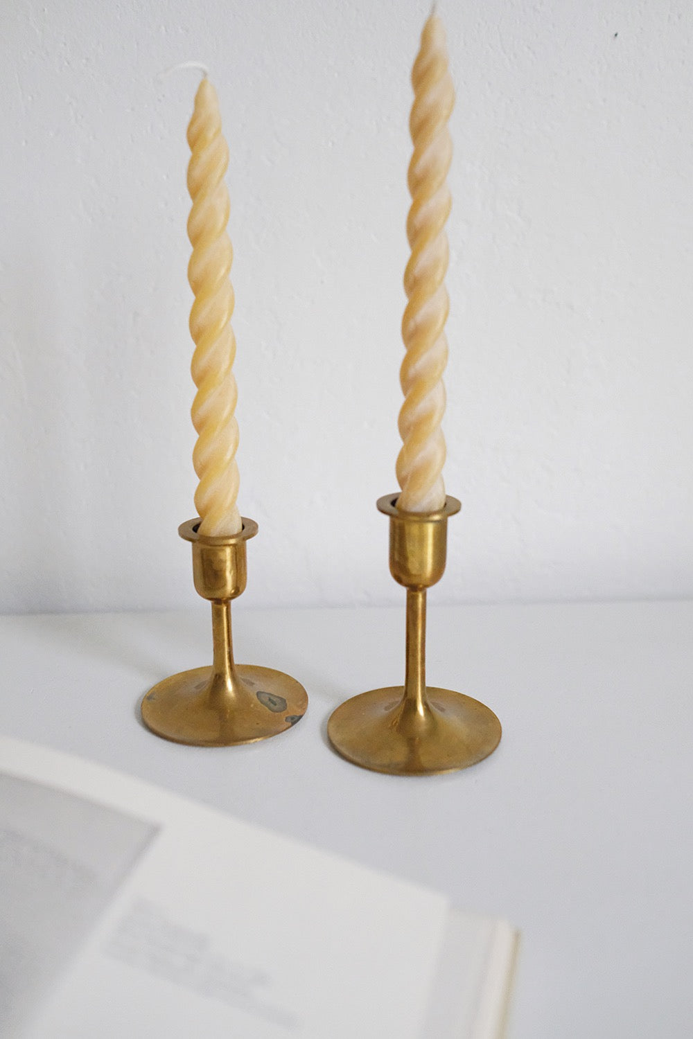 graduated brass candlesticks - set of 2