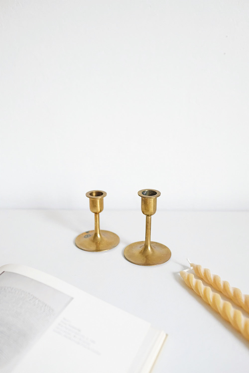graduated brass candlesticks - set of 2
