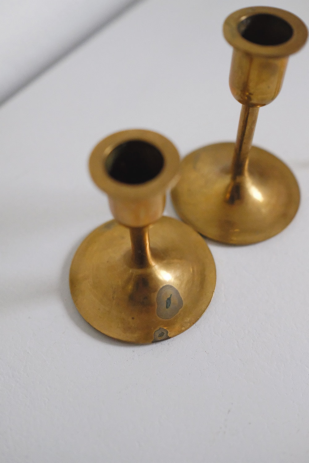graduated brass candlesticks - set of 2