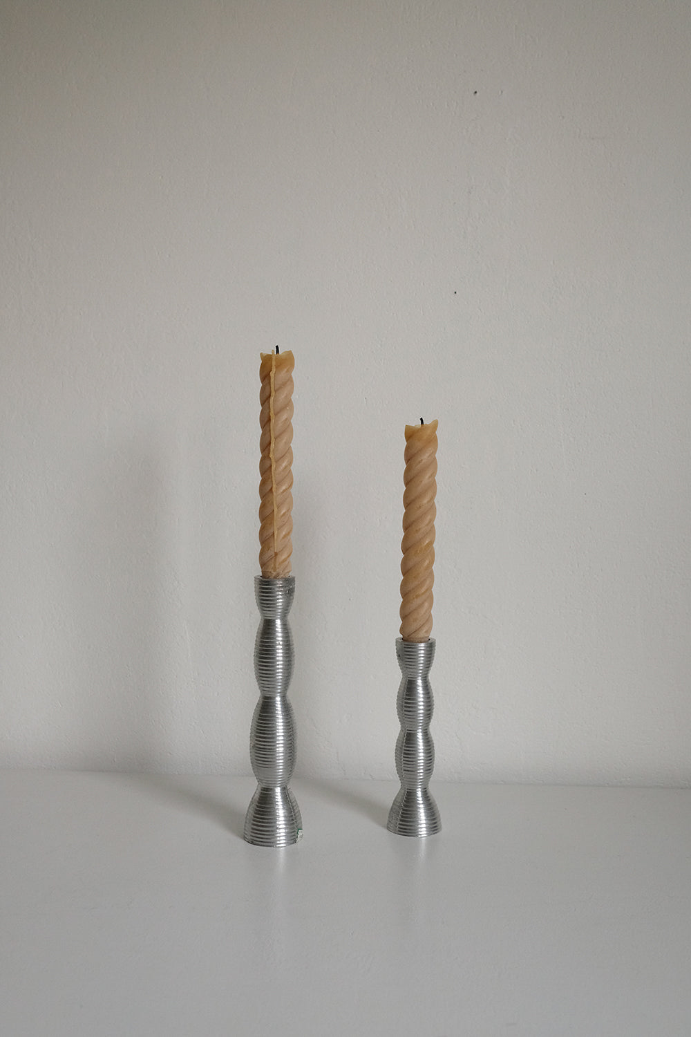 silver metal candlesticks