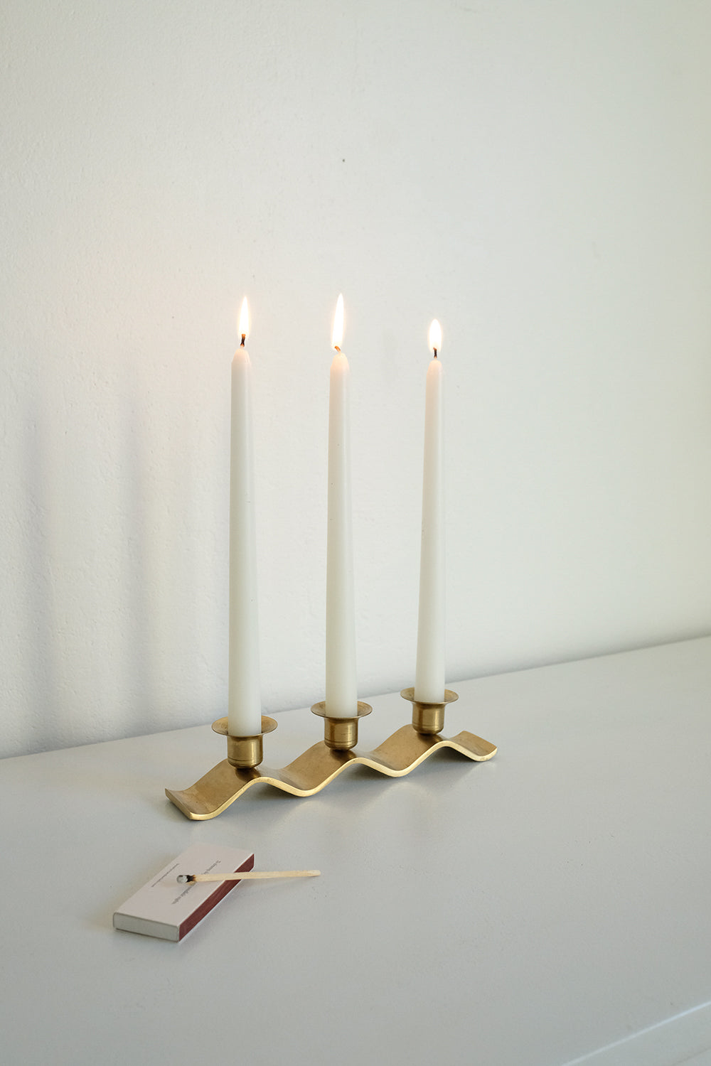 brass wavy candleholder