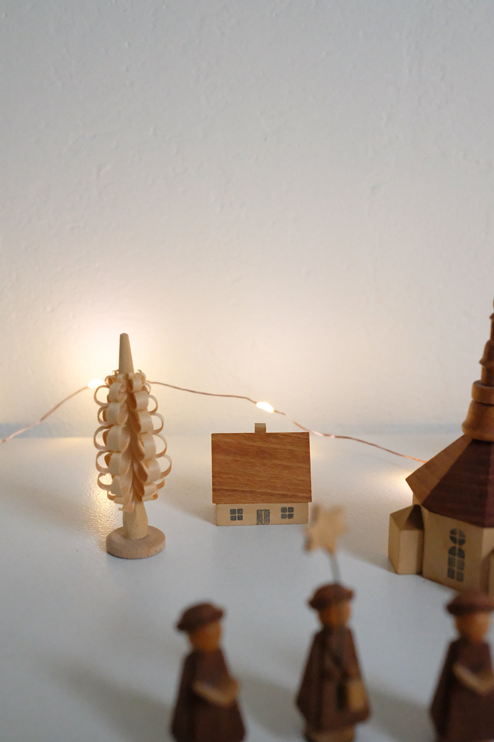 handmade wooden carolers scene
