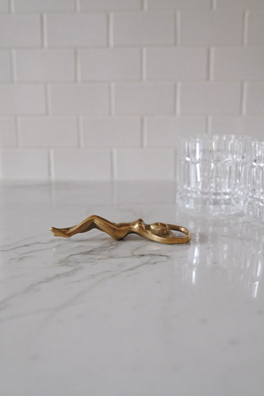 brass lady bottle opener