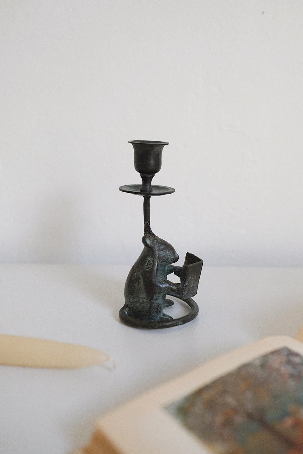 book mouse candlestick