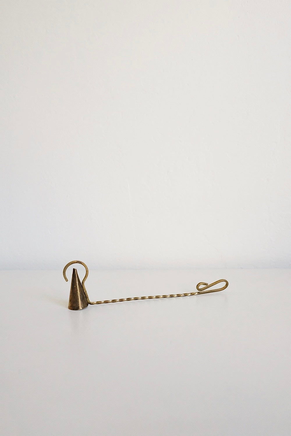 brass candle snuffer