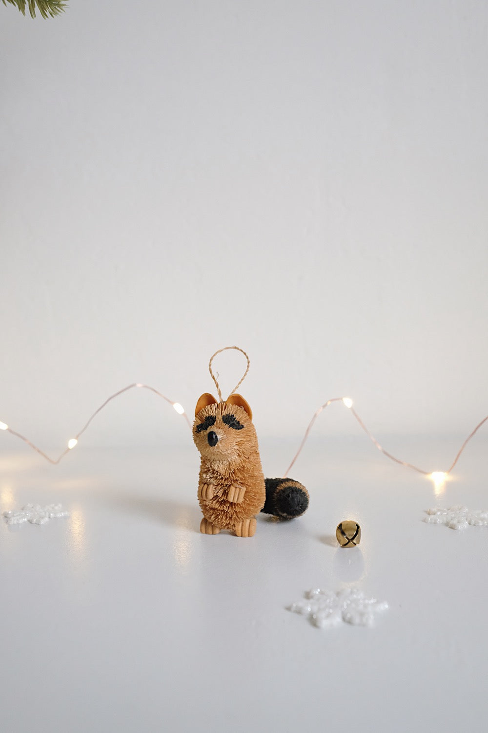 bottlebrush raccoon ornament