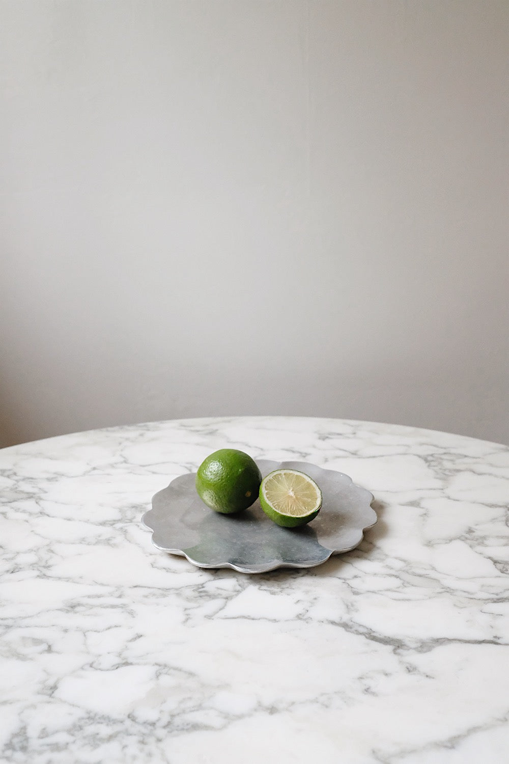 scalloped metal dish