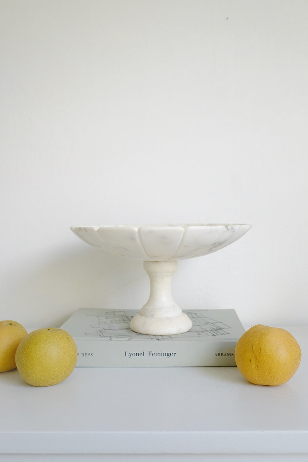 scalloped alabaster pedestal