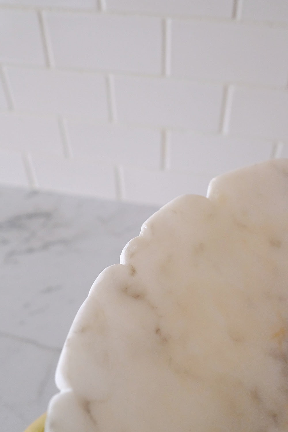 scalloped alabaster pedestal