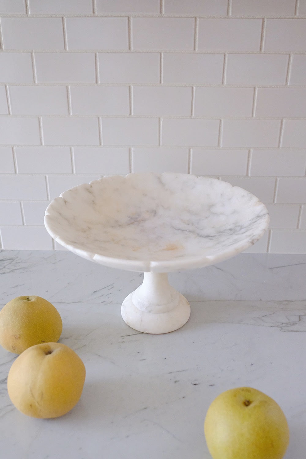 scalloped alabaster pedestal