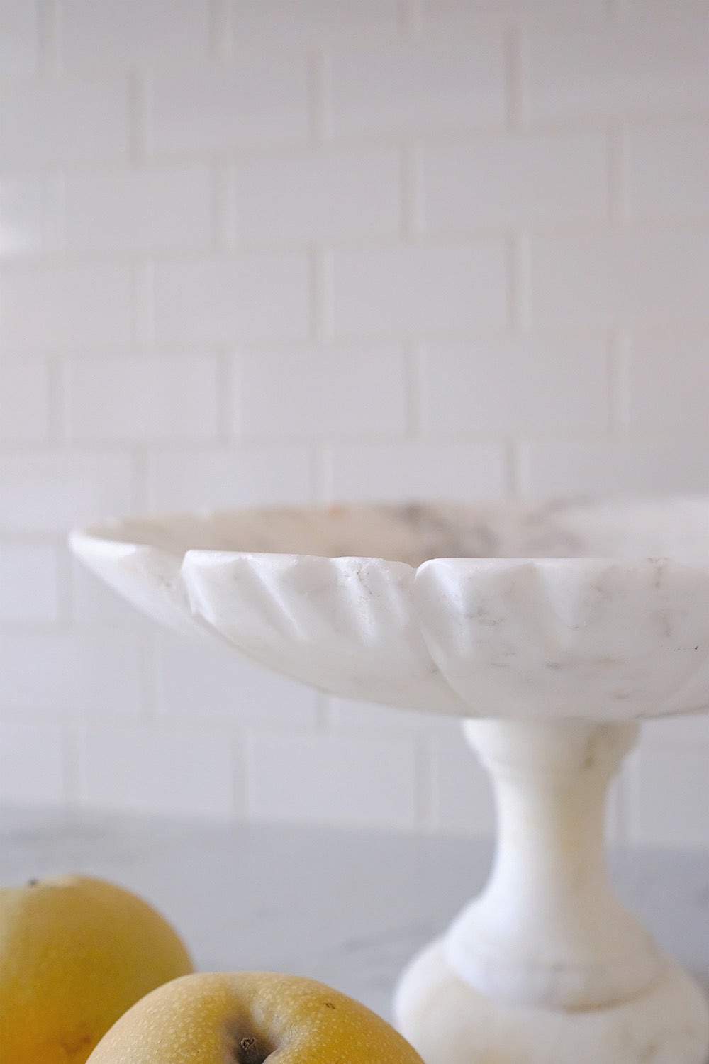 scalloped alabaster pedestal