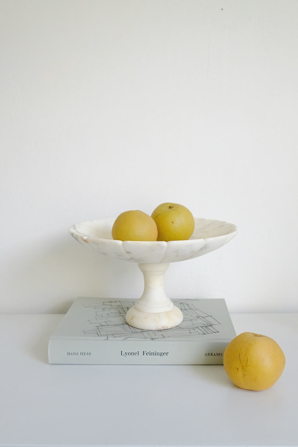 scalloped alabaster pedestal