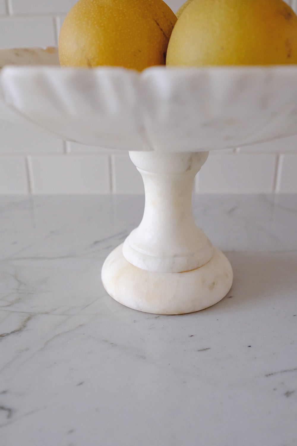 scalloped alabaster pedestal