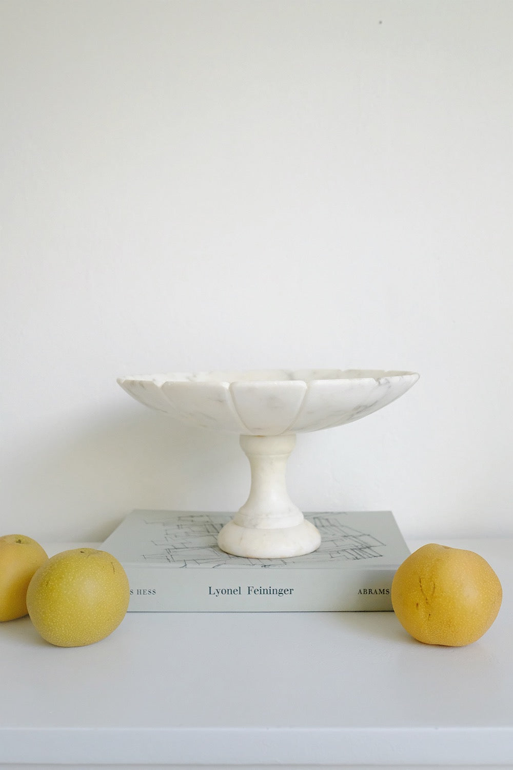 scalloped alabaster pedestal