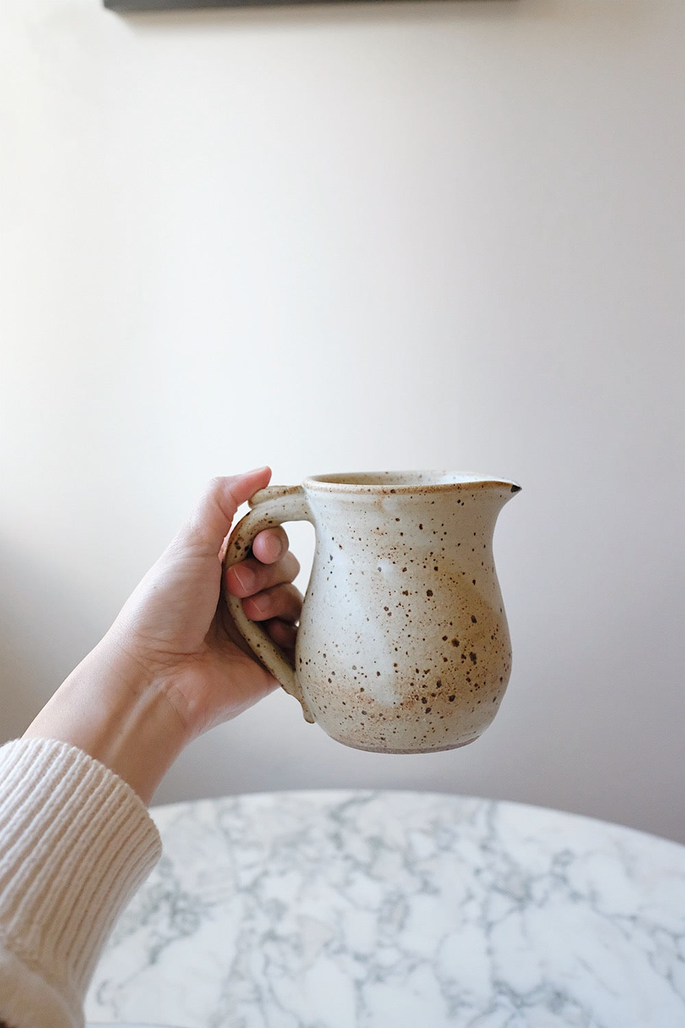 small ceramic pitcher