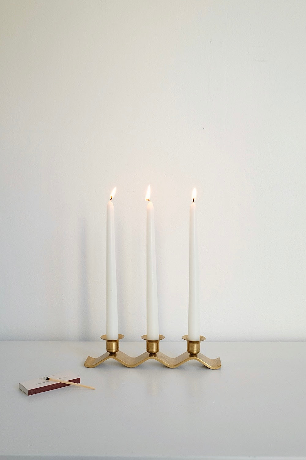 brass wavy candleholder