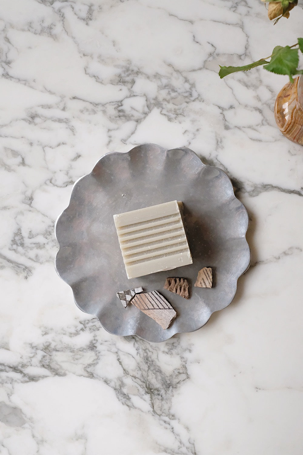 scalloped metal dish