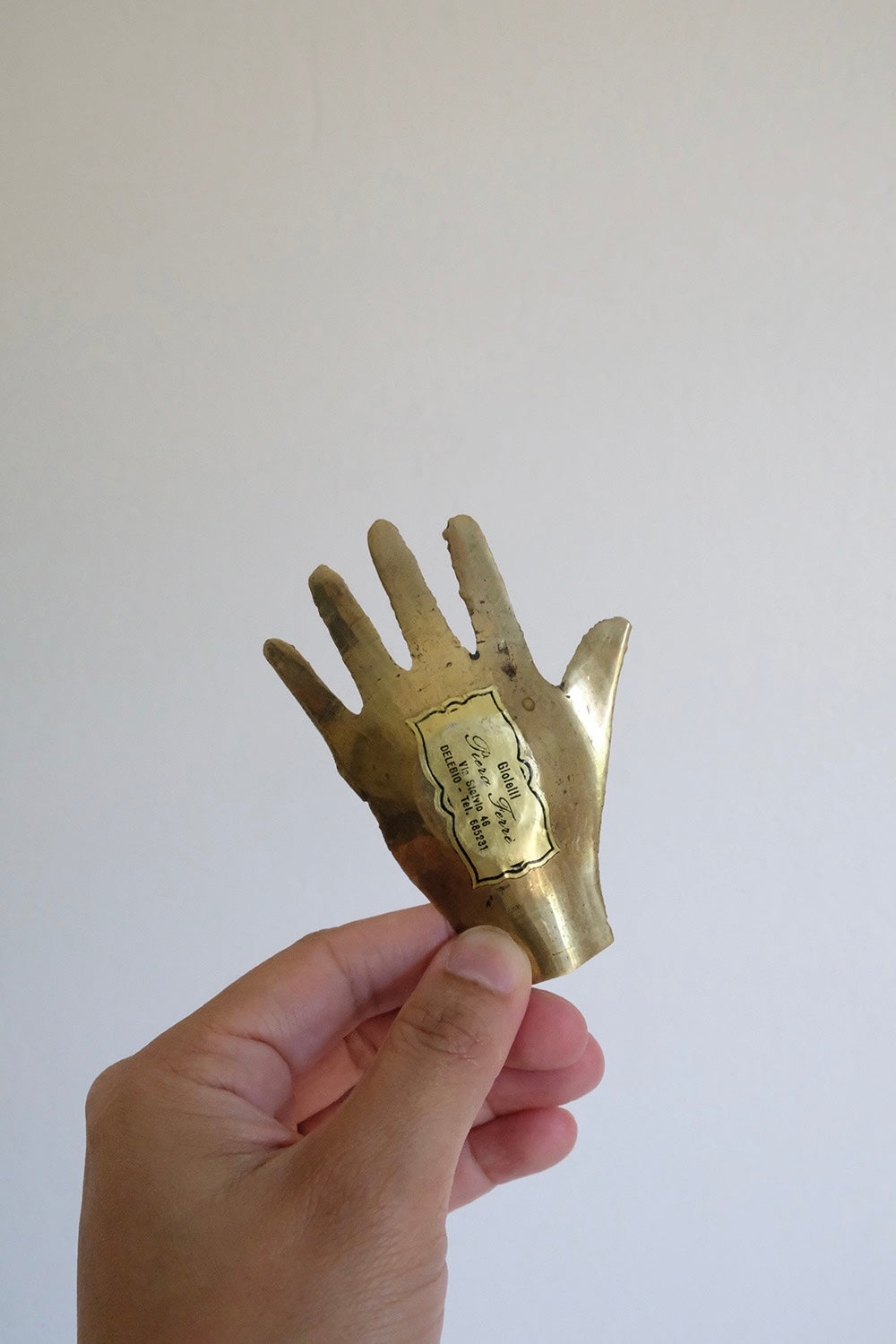 brass hand