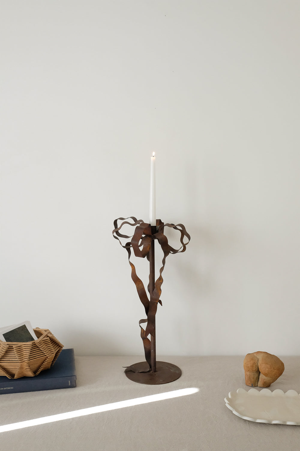 metal bow candlestick