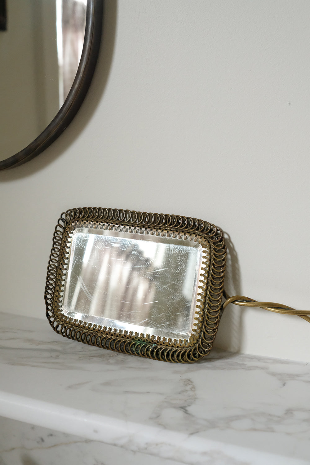 antique brass hand mirror