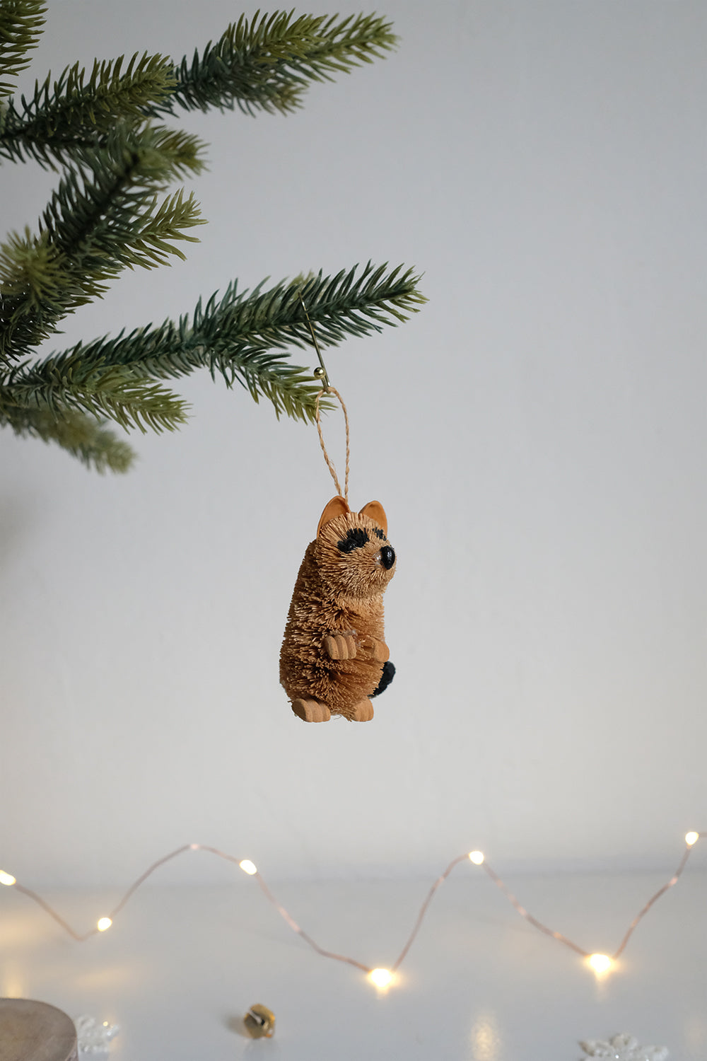 bottlebrush raccoon ornament