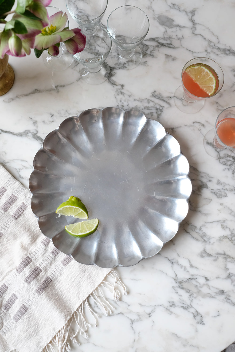 scalloped metal dish