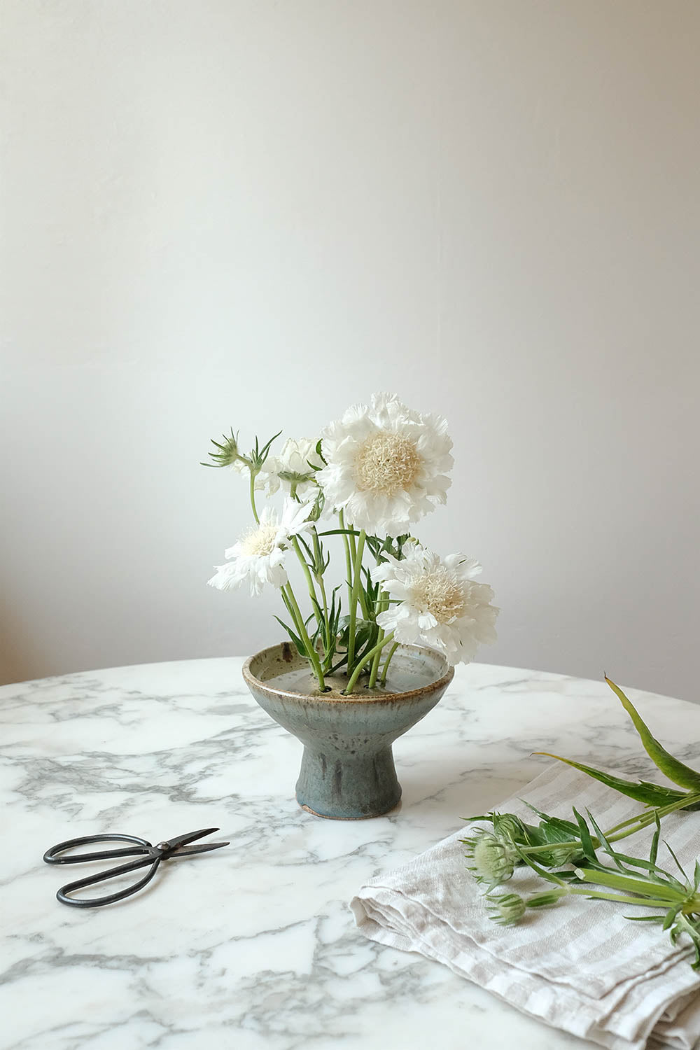 handmade ikebana vase with brass flower frog