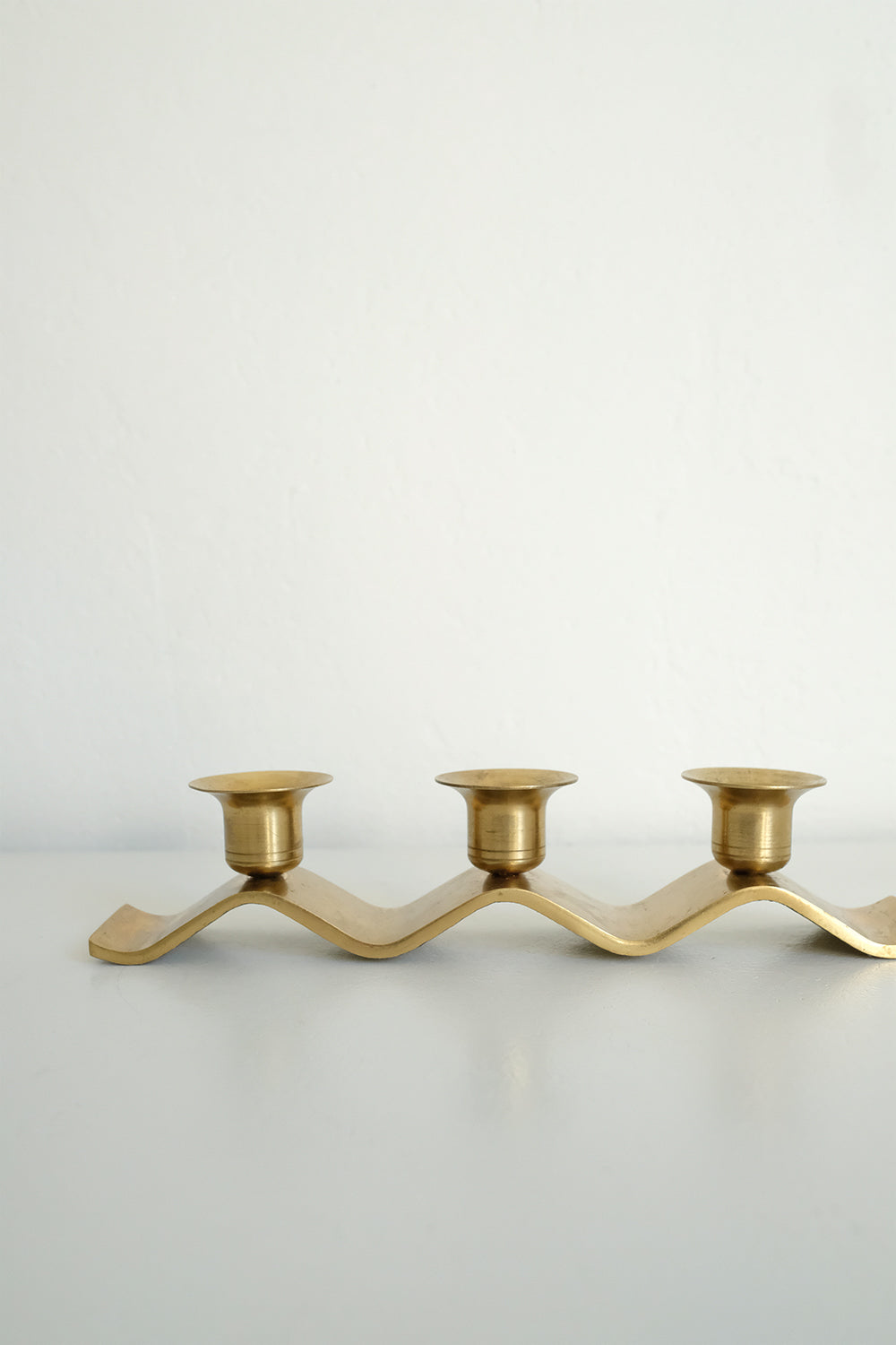 brass wavy candleholder