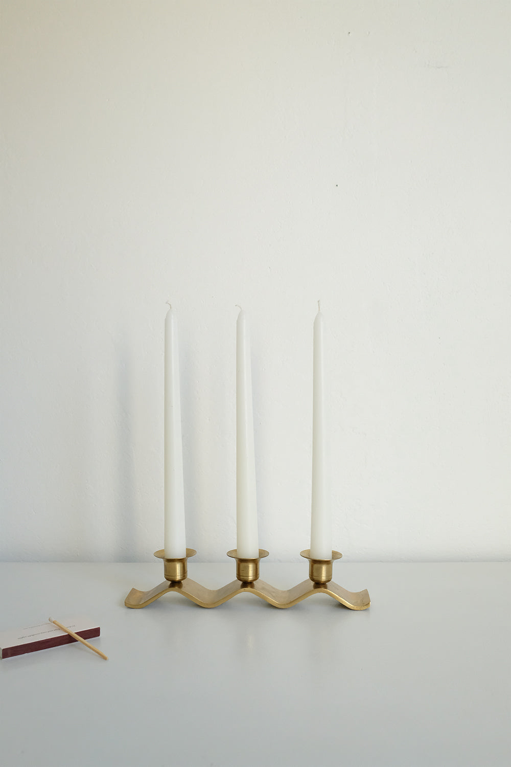 brass wavy candleholder