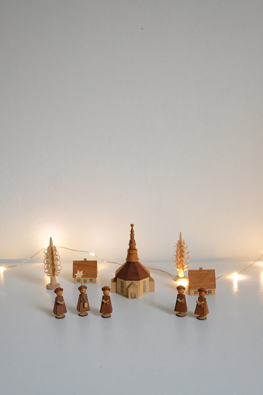 handmade wooden carolers scene