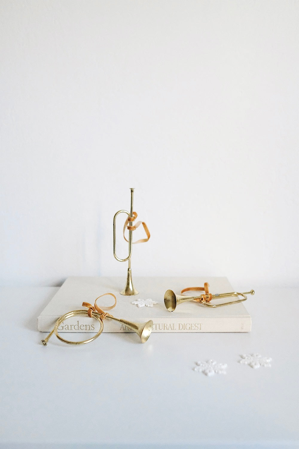 gold metal horn ornaments - set of 3