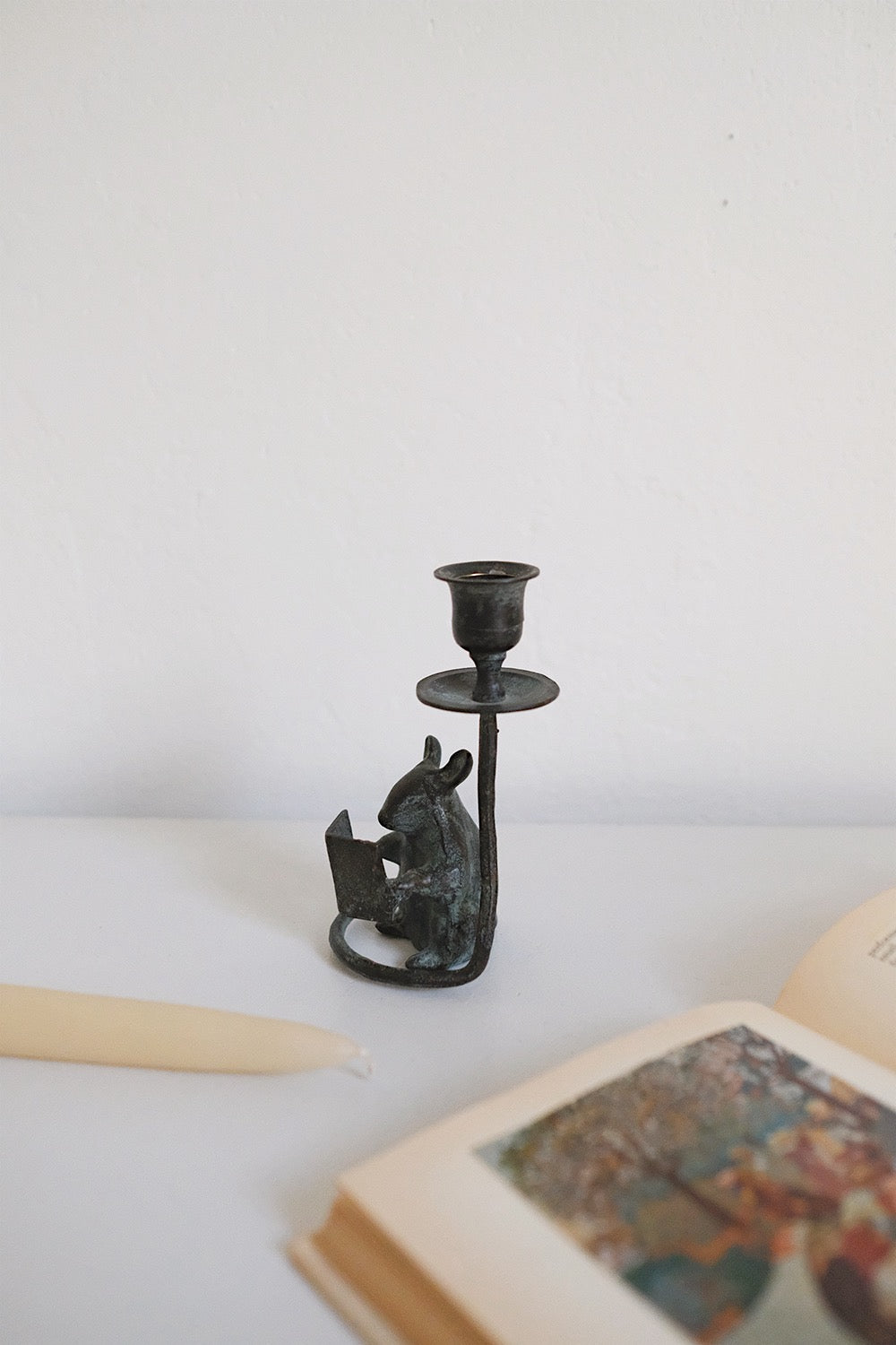book mouse candlestick